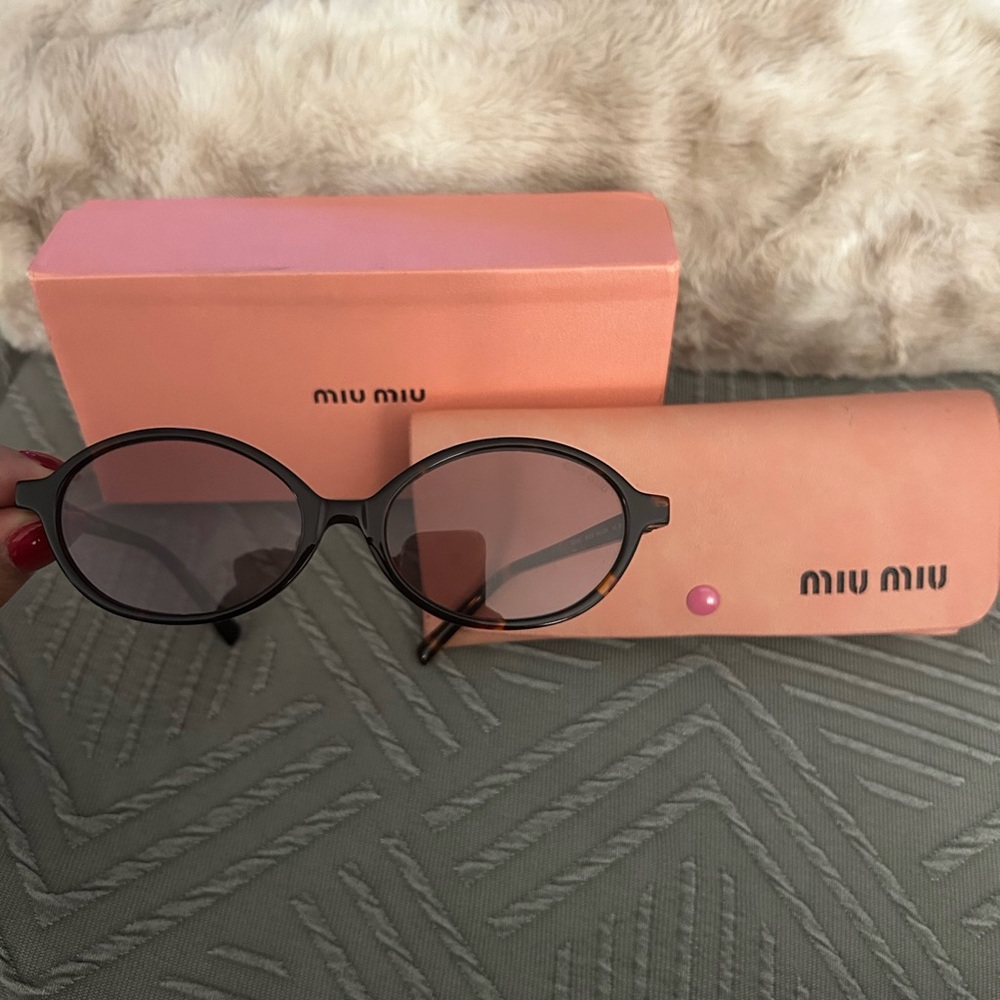 Miu Miu tortoise shell color sunglasses